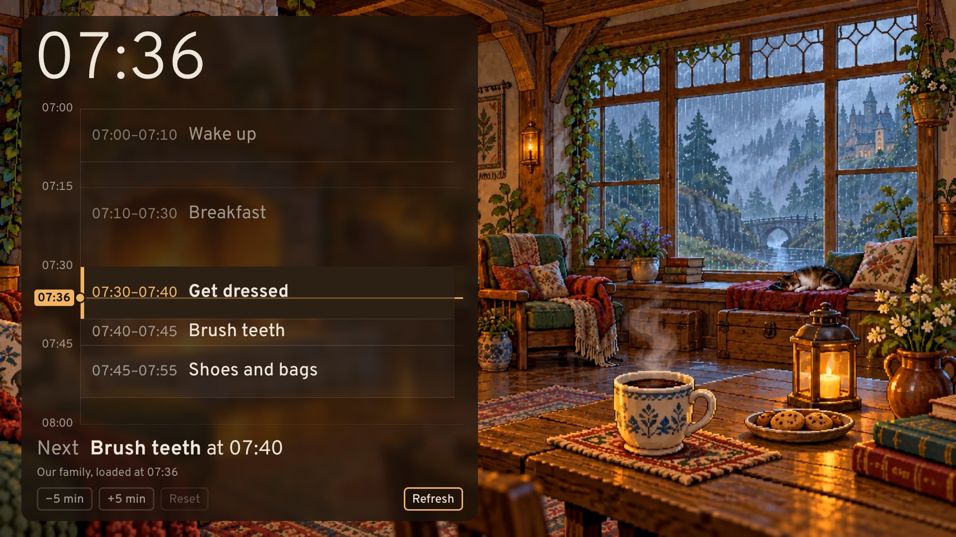 A TV showing the morning routine over a cottage with a fire and rain at the window. The clock says 07:36; Get dressed is lit as the task now, and Brush teeth is next at 07:40.